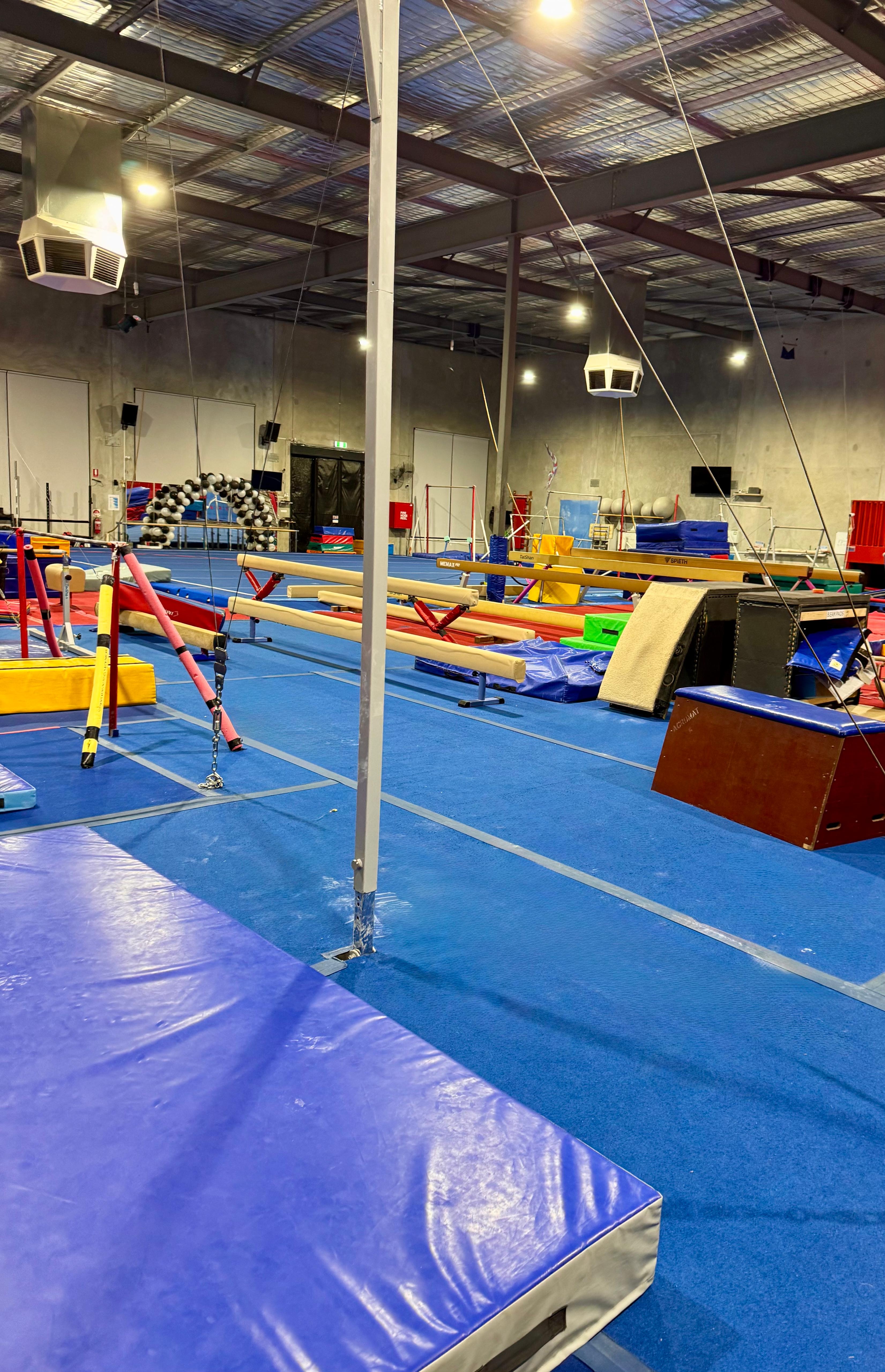 After cleaning example showing an improved gym floor in a large facility